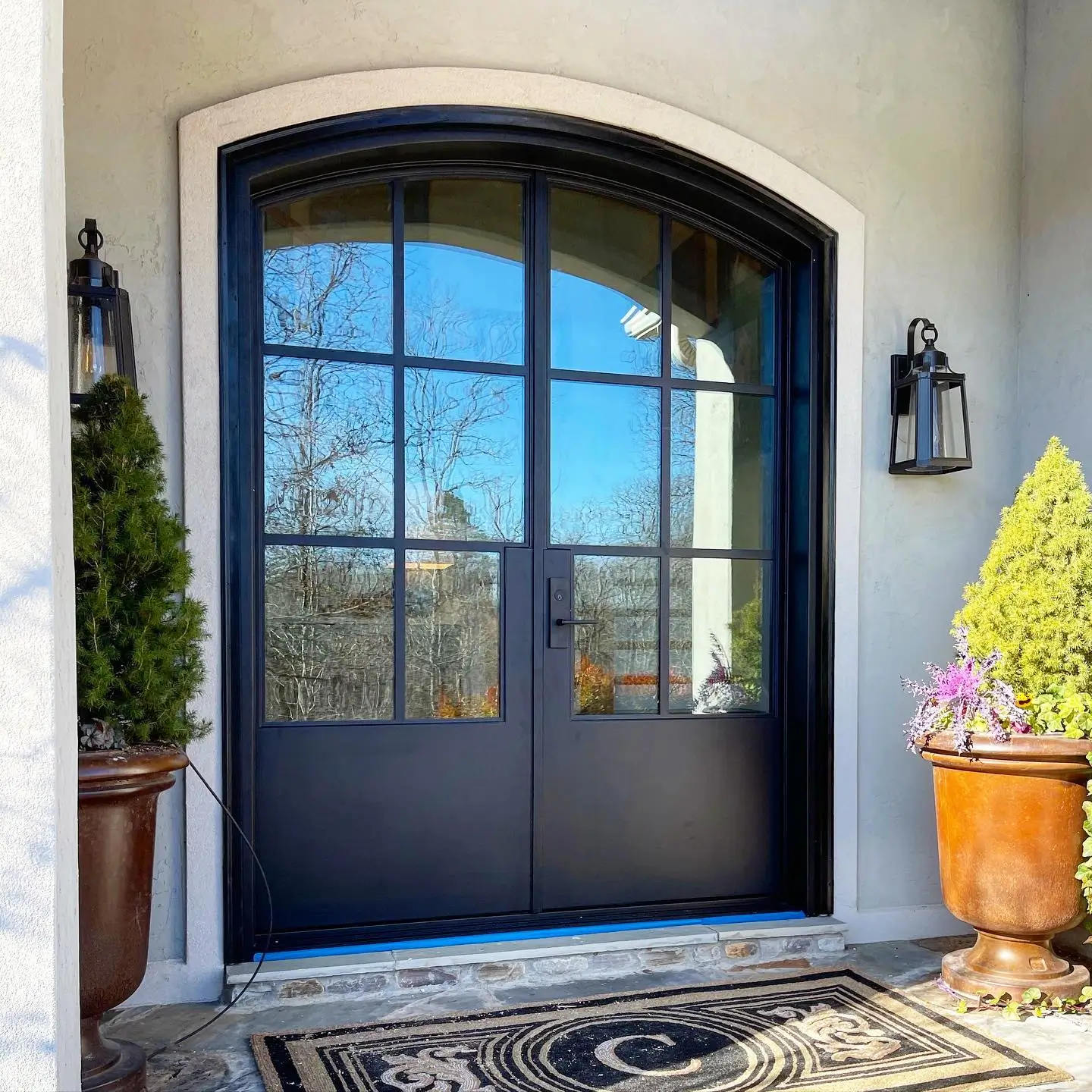black steel external arched doors with screen manufacturer UK